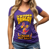 Female wearing a purple deep vee neck t-shirt with Swamp Dragon logo and "Liquor Hot Sauce" on front