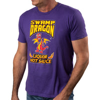 Man in purple t-shirt. The shirt has the Swamp Dragon logo, and says "Liquor Hot Sauce."
